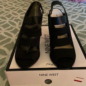 Nine West open toe. Black and never been worn. 4 inch heel.